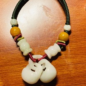 Hand carved and hand knitted bracelet